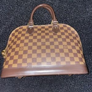 Brown Louis Vuitton handbag